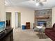 Cozy living room with a stone fireplace at 260 Lake Dr, Summerville, SC 29483