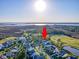 Beautiful aerial view showcasing the home's proximity to a golf course and waterfront at 2640 Crooked Stick Ln, Mount Pleasant, SC 29466