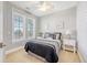 Bright bedroom with large windows, neutral walls, and a queen-size bed at 2640 Crooked Stick Ln, Mount Pleasant, SC 29466