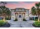 Stunning two-story home with a grand entrance, dual garages, and lush landscaping at 2640 Crooked Stick Ln, Mount Pleasant, SC 29466