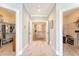 Hallway with access to carpeted bedrooms and a staircase in the background at 2640 Crooked Stick Ln, Mount Pleasant, SC 29466