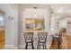 Modern kitchen with a breakfast bar, pendant lighting, and ample cabinet space at 2640 Crooked Stick Ln, Mount Pleasant, SC 29466