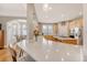 Bright kitchen featuring granite countertops, a large island, and stainless steel appliances at 2640 Crooked Stick Ln, Mount Pleasant, SC 29466