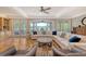 Spacious living room with coffered ceilings, a ceiling fan, and a large sectional sofa at 2640 Crooked Stick Ln, Mount Pleasant, SC 29466