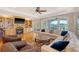 Comfortable living room featuring a fireplace, built-in shelves, and an expansive view at 2640 Crooked Stick Ln, Mount Pleasant, SC 29466