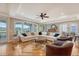 Open-concept living room with plenty of natural light and comfortable seating at 2640 Crooked Stick Ln, Mount Pleasant, SC 29466