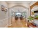 Elegant entryway that opens to a spacious living room with hardwood floors and golf course views at 2640 Crooked Stick Ln, Mount Pleasant, SC 29466