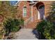 Close up of the front entrance showcasing brick steps, white railings, and the front door at 2800 Waterpointe Cir, Mount Pleasant, SC 29466