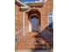 Close up of the front entrance showcasing brick steps, white railings, and the arched front door at 2800 Waterpointe Cir, Mount Pleasant, SC 29466