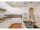 Gourmet kitchen with granite countertops and island with stainless faucet at 2800 Waterpointe Cir, Mount Pleasant, SC 29466