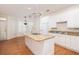 Kitchen with granite countertops, kitchen island, stainless faucet and hardwood flooring at 2800 Waterpointe Cir, Mount Pleasant, SC 29466