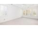 Spacious main bedroom with large windows and neutral carpet at 2800 Waterpointe Cir, Mount Pleasant, SC 29466