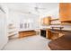 Bright office space featuring built-in desk, cabinets, shelving, and large window for natural light at 2800 Waterpointe Cir, Mount Pleasant, SC 29466