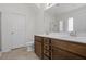 Bright bathroom has a double vanity, a separate toilet area, and a glass-enclosed shower at 2911 Penobscot Dr, North Charleston, SC 29420
