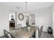 Elegant dining room featuring a stylish chandelier and view of the kitchen at 2911 Penobscot Dr, North Charleston, SC 29420