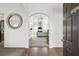 Bright foyer with decorative mirror and entry to the formal living room at 2911 Penobscot Dr, North Charleston, SC 29420