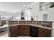 Spacious kitchen with dark wood cabinets, granite countertops, and ample counter space for cooking and entertaining at 2911 Penobscot Dr, North Charleston, SC 29420