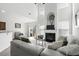 Bright living room with tall ceilings, fireplace, and access to the backyard at 2911 Penobscot Dr, North Charleston, SC 29420