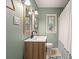 Well-lit bathroom with modern vanity, neutral tones, and a shower-tub combination for everyday convenience at 2988 Bolton Rd, Charleston, SC 29414