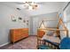 Inviting bedroom with playful decor, twin beds, and coordinated furniture at 2988 Bolton Rd, Charleston, SC 29414
