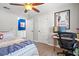 Bedroom with a ceiling fan, decorative poster and dedicated workspace at 2988 Bolton Rd, Charleston, SC 29414