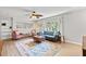 Cozy living room featuring stylish furniture, a modern rug, and plenty of space for entertaining at 2988 Bolton Rd, Charleston, SC 29414