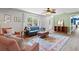 Inviting living room with comfortable seating, a modern rug, and a view to other rooms at 2988 Bolton Rd, Charleston, SC 29414