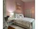 Serene bedroom with pastel walls, a plush bed, and ample natural light creating a peaceful retreat at 309 Meeting St # 8, Charleston, SC 29401