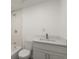 Modern bathroom with white vanity, toilet, and shower-tub combination at 3364 Osceola St, North Charleston, SC 29405