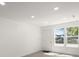 Bright living room with natural light and neutral paint at 3364 Osceola St, North Charleston, SC 29405