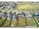 Enjoy this aerial view of a well-planned community with homes, green spaces, and amenities at 361 Ripple Park Dr, Summerville, SC 29486
