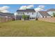 Expansive backyard, perfect for outdoor activities and relaxation with a beautiful screened porch at 361 Ripple Park Dr, Summerville, SC 29486