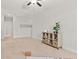 Neutral bonus room with soft carpet, shelves, and natural light through a large window at 361 Ripple Park Dr, Summerville, SC 29486