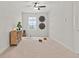 A multi-purpose bonus room with carpet, shelving and a yoga mat set up at 361 Ripple Park Dr, Summerville, SC 29486