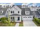 Charming two-story home featuring a welcoming front porch and a two-car garage at 361 Ripple Park Dr, Summerville, SC 29486