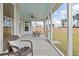 Enjoy the outdoors on this screened-in porch, offering views of the well-maintained backyard at 361 Ripple Park Dr, Summerville, SC 29486