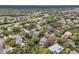 An aerial view of a coastal neighborhood featuring lush landscaping near the beach at 3635 Pompano Ct, Seabrook Island, SC 29455