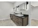 Modern bathroom featuring a double sink vanity with rectangular vessel sinks at 3635 Pompano Ct, Seabrook Island, SC 29455