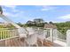 Charming deck with comfortable wicker furniture, offering a relaxing outdoor space at 3635 Pompano Ct, Seabrook Island, SC 29455
