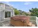 Outdoor hot tub on a private deck, perfect for relaxation and enjoying the serene surroundings at 3635 Pompano Ct, Seabrook Island, SC 29455