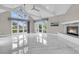 Spacious living room with vaulted ceilings, marble flooring, and many windows at 3635 Pompano Ct, Seabrook Island, SC 29455