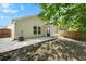 Backyard with concrete patio and partial shade from trees and house at 3802 Annapolis Way, Ladson, SC 29456