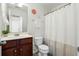 A bathroom featuring a vanity, a large mirror, and a shower with white curtain at 3802 Annapolis Way, Ladson, SC 29456