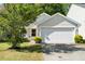 Charming home featuring a two-car garage, well-kept lawn, and lovely curb appeal at 3802 Annapolis Way, Ladson, SC 29456