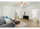 Inviting living room with wood floors, neutral paint, and a decorative area rug at 3802 Annapolis Way, Ladson, SC 29456
