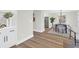 View of an open dining area, adjacent to a kitchen with modern decor at 397 Parkdale Dr, Charleston, SC 29414