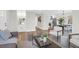 Open-concept living area with modern furniture, hardwood floors, and ample space at 397 Parkdale Dr, Charleston, SC 29414