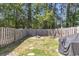 View of backyard with fire pit area, lawn, and privacy fence at 4807 Habersham Ln, Summerville, SC 29485