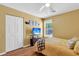Comfortable bedroom featuring a bed, wooden floors, a tv, and a ceiling fan at 4807 Habersham Ln, Summerville, SC 29485