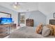 Comfortable bedroom with wooden furniture, soft carpet, and natural light from the window at 4807 Habersham Ln, Summerville, SC 29485